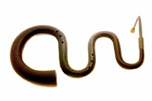 Detailed image of a dark bronze Basstuba in F, an F bass tuba, or a tuba basse en fa, showing its serpentine, S-shaped tubing from the mouthpiece to the flared bell.