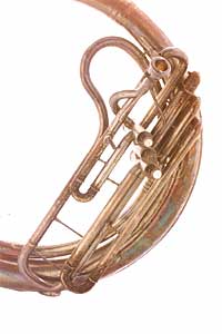 Kontrabasstuba in Bb brasswind instrument, viewed from the side, showcasing its intricate tubing and valves.
