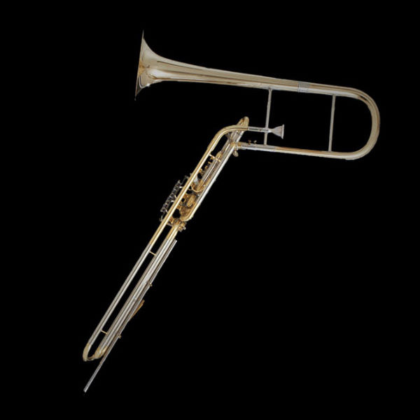 Gold-lacquered brass valved trombone with slide, an aerophone and brass wind instrument, on a black background.