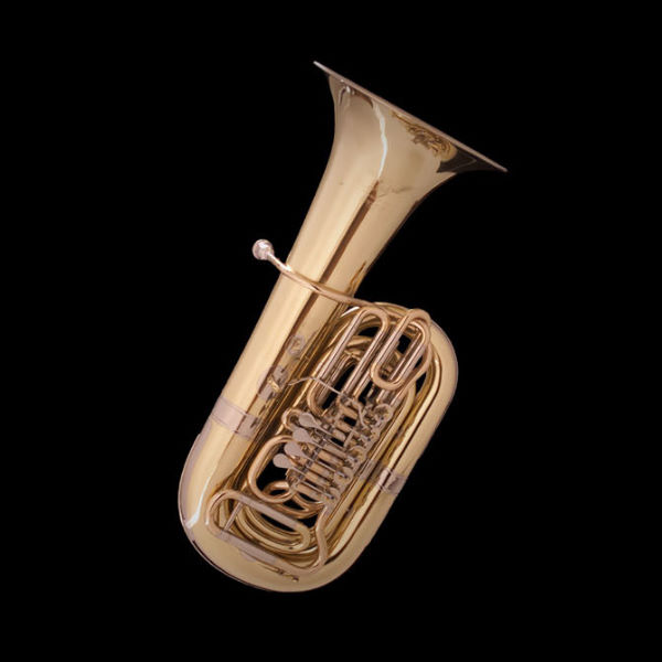 Brass Kontrabasstuba in Bb, a large gold contrabass tuba wind musical instrument with valves and tubing, against a dark background