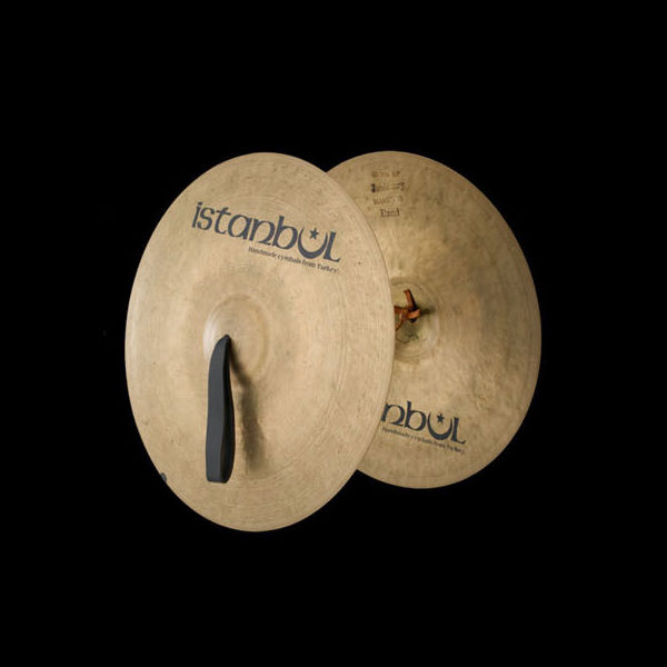 Pair of Istanbul brand Turkish cymbals (Beckena due, piatti, cymbales) for musical instruments, on a black background.