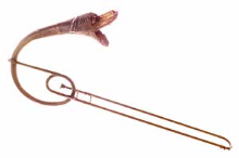 Unique tenor trombone slide with a curved, ornate brass dragon head and open mouth bell resembling a serpent.